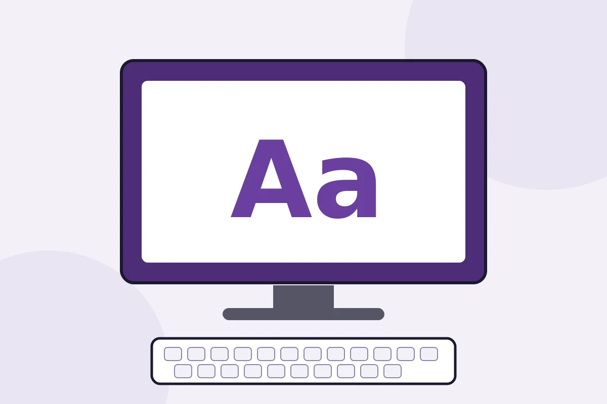 Ilustrație: monitor cu literele mărite pe ecran de o lupă software, deasupra unei tastaturi